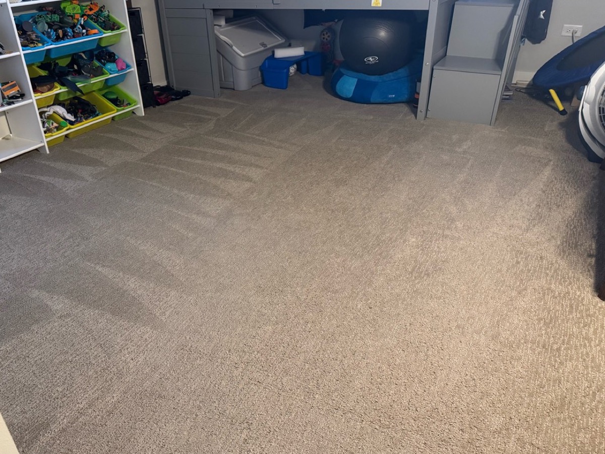 After: Carpeted bedroom with traffic soil and scattered spots, then the room after cleaning