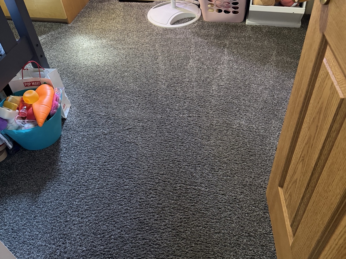 Finished children's bedroom carpet viewed from the doorway